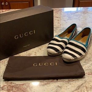 Women’s Gucci striped real fur slip-on.